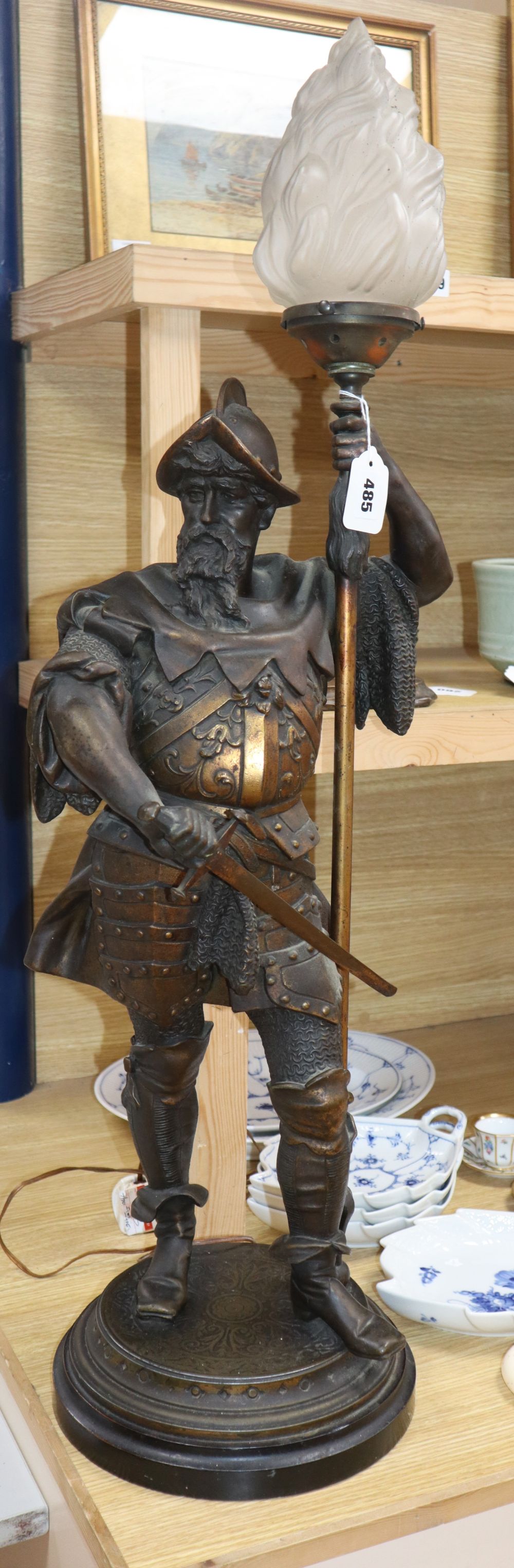 A gilt spelter warrior lamp with shade